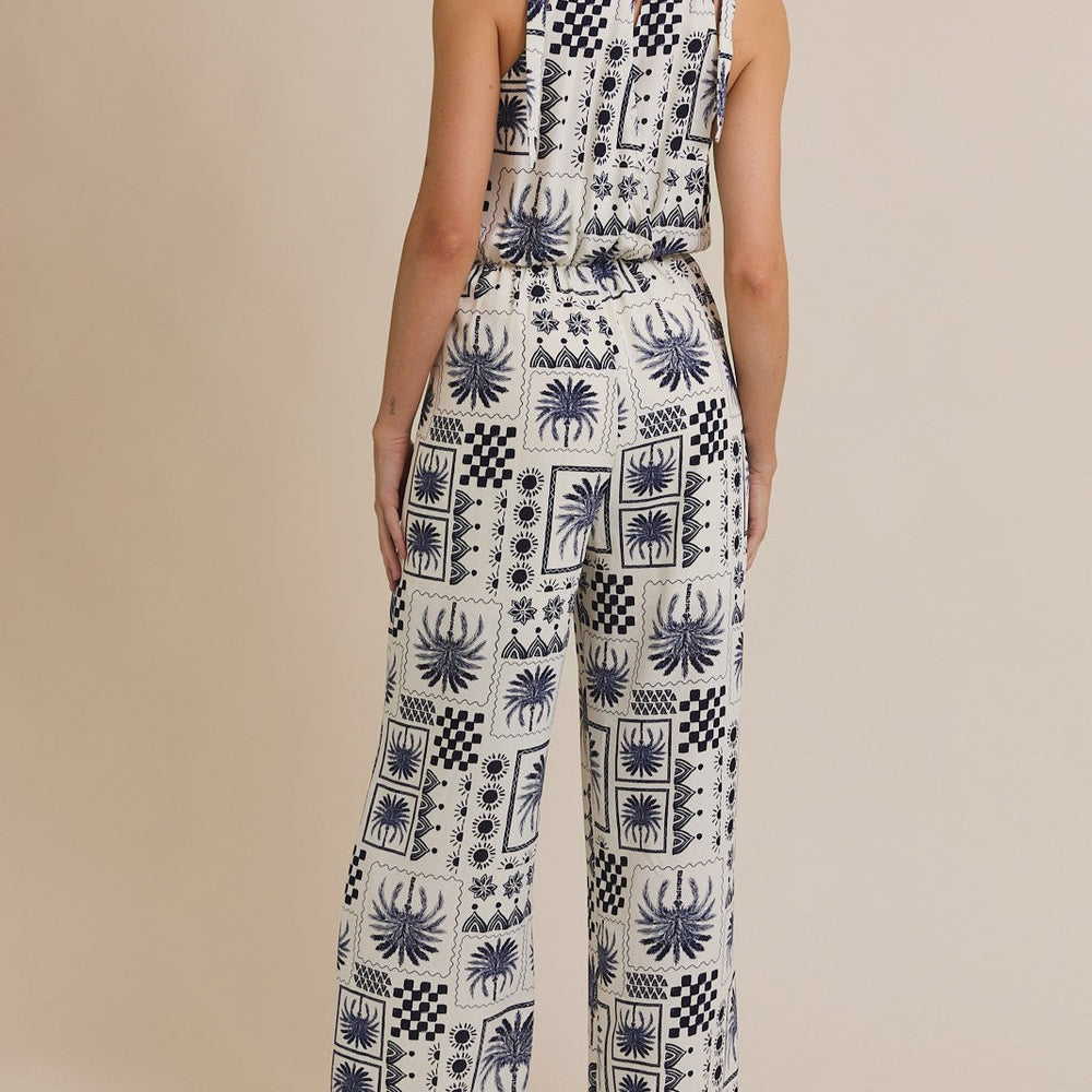 
                  
                    Abstract Halter Jumpsuit
                  
                