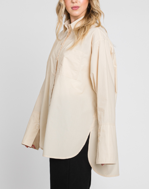 
                  
                    Krista Wide Sleeve Button Down
                  
                