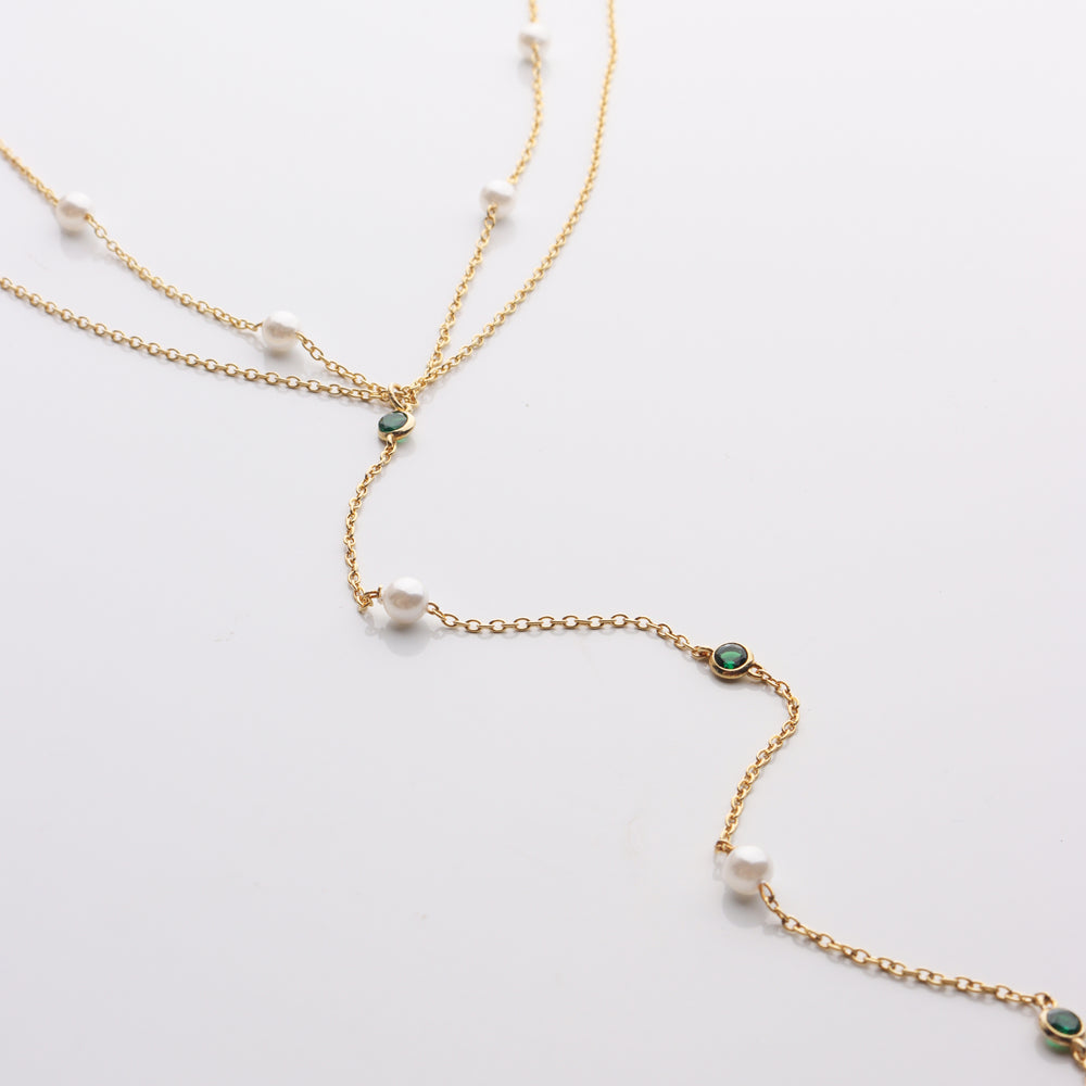 
                  
                    Pearl & Emerald Lariat Necklace
                  
                