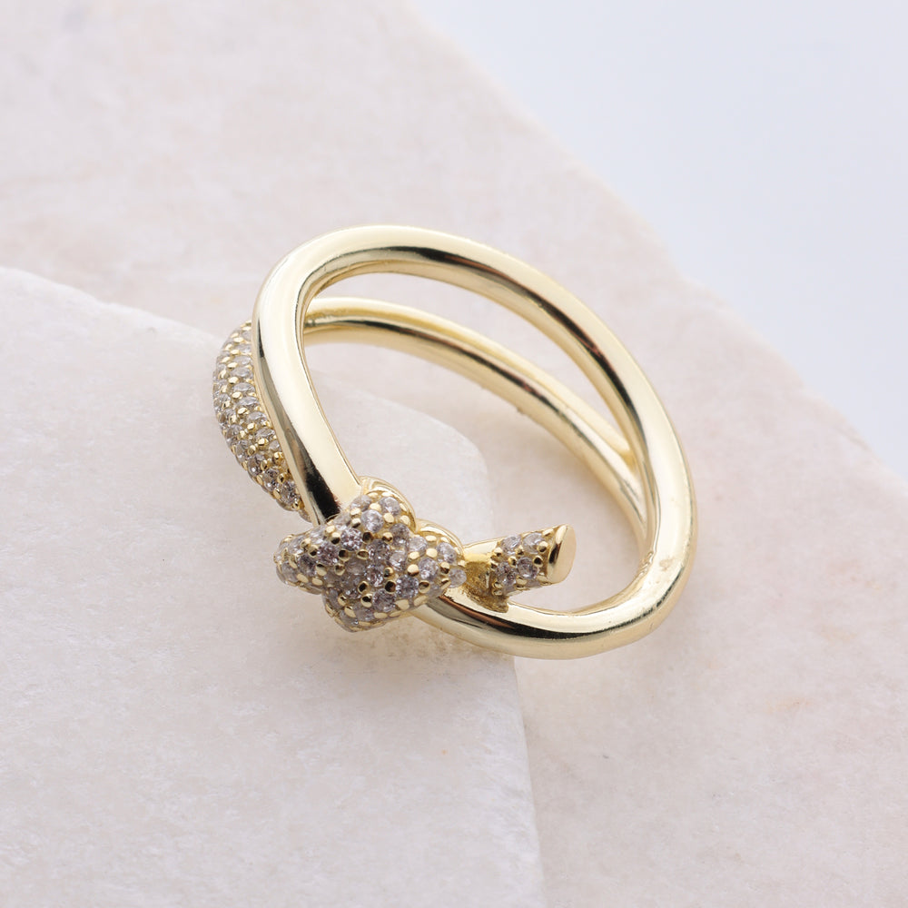 
                      
                        Loop Knot CZ Ring
                      
                    