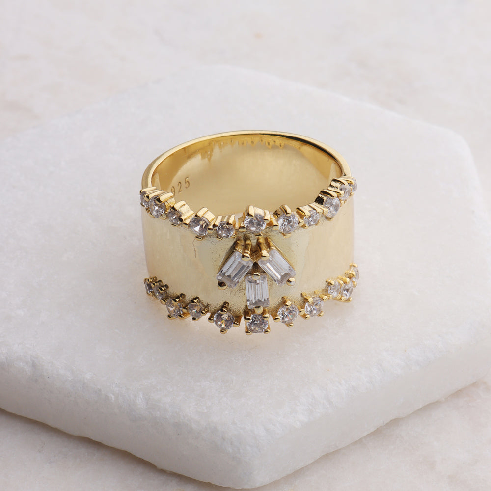 
                      
                        Baguette Wide Band Ring
                      
                    