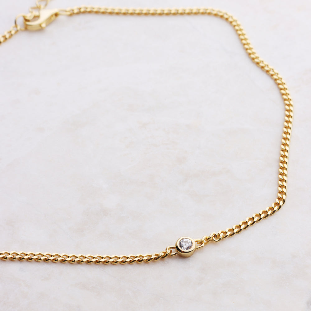 
                  
                    Tiny CZ Cuban Link Chain Anklet
                  
                