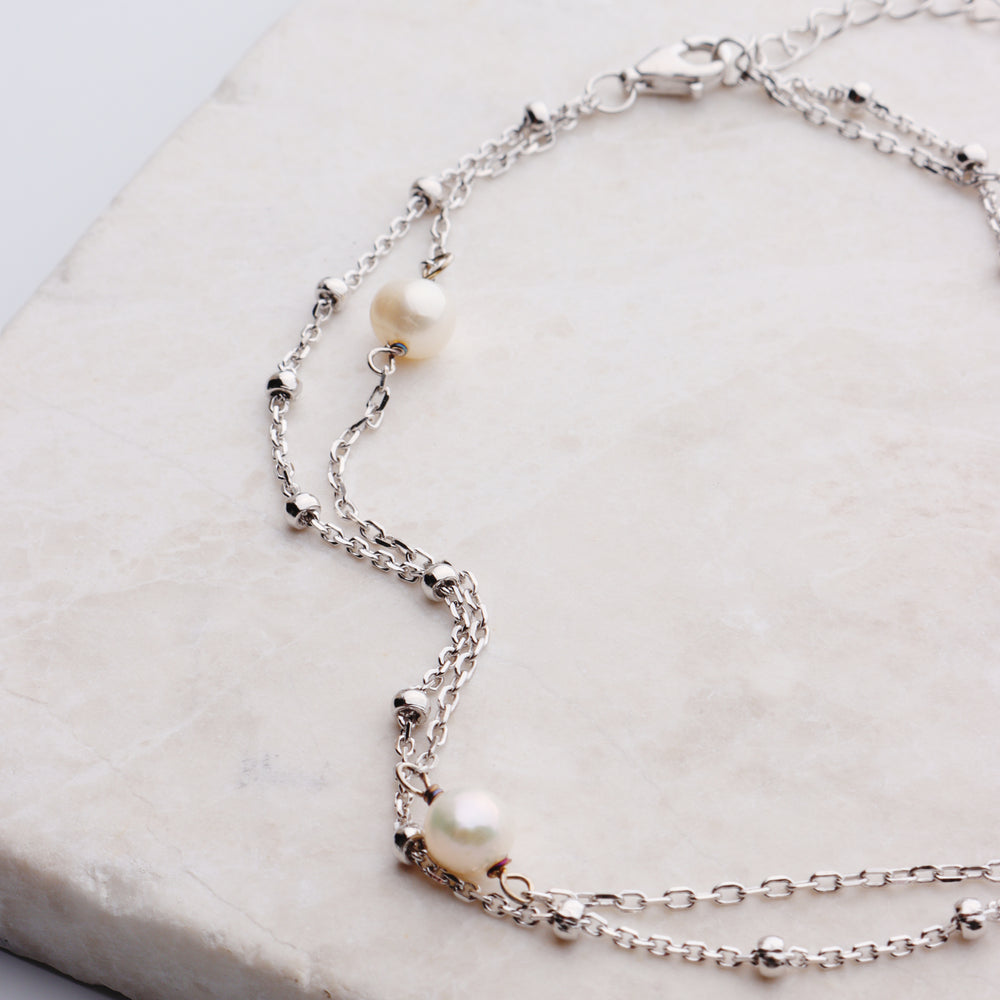 
                  
                    Layered Pearl & Dotted Chain Anklet
                  
                