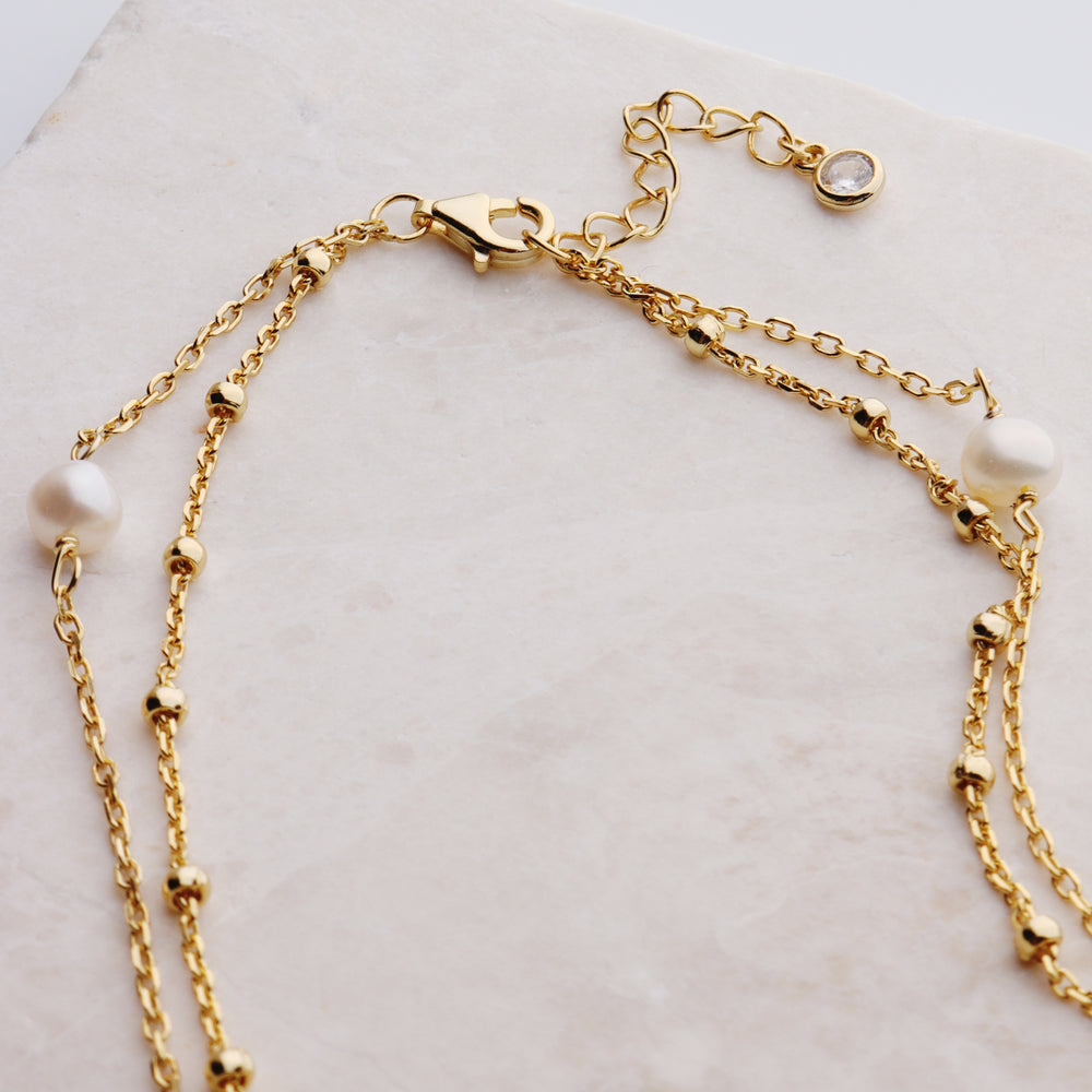 
                  
                    Layered Pearl & Dotted Chain Anklet
                  
                